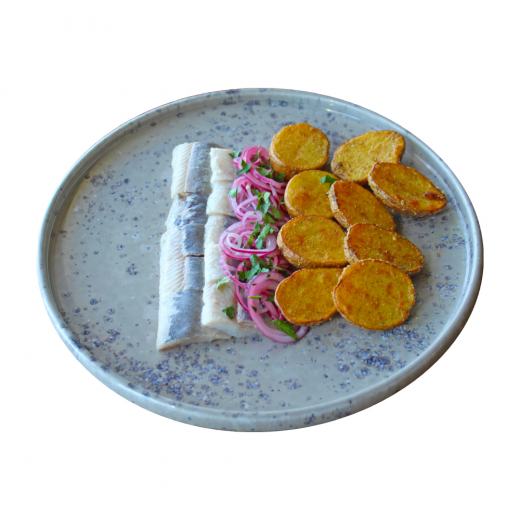 Herring with pickled onions and potatoes baked in Georgian spices